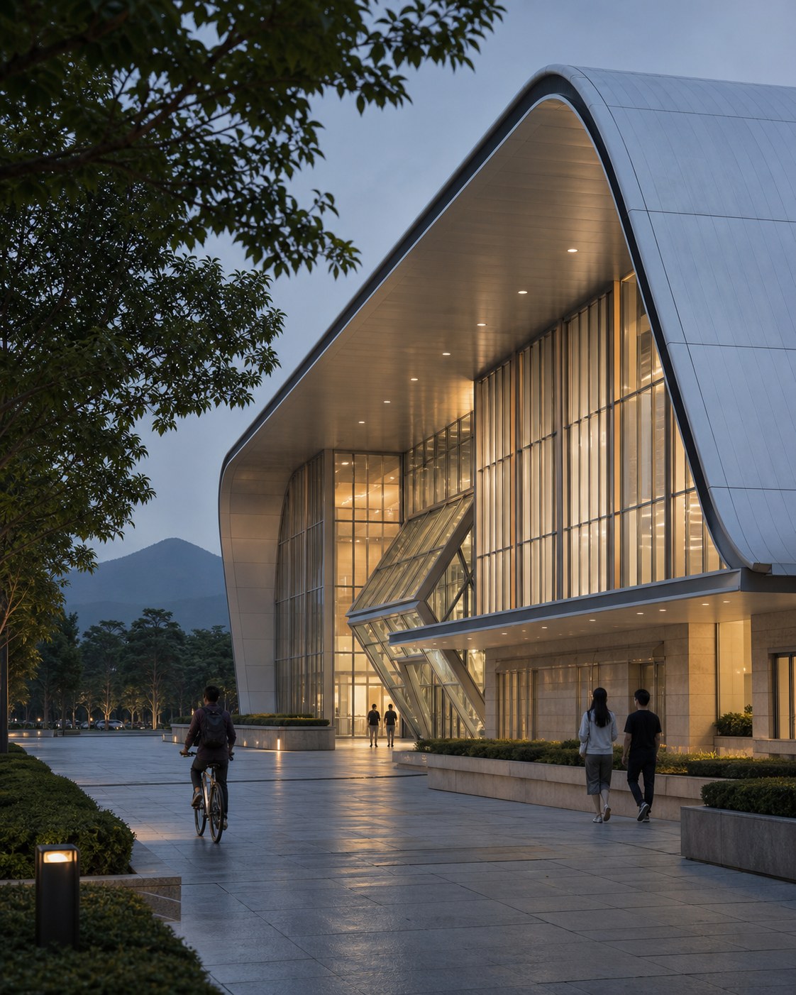 Visitors and a cyclist approaching the stadium beneath its curved sheltered edge